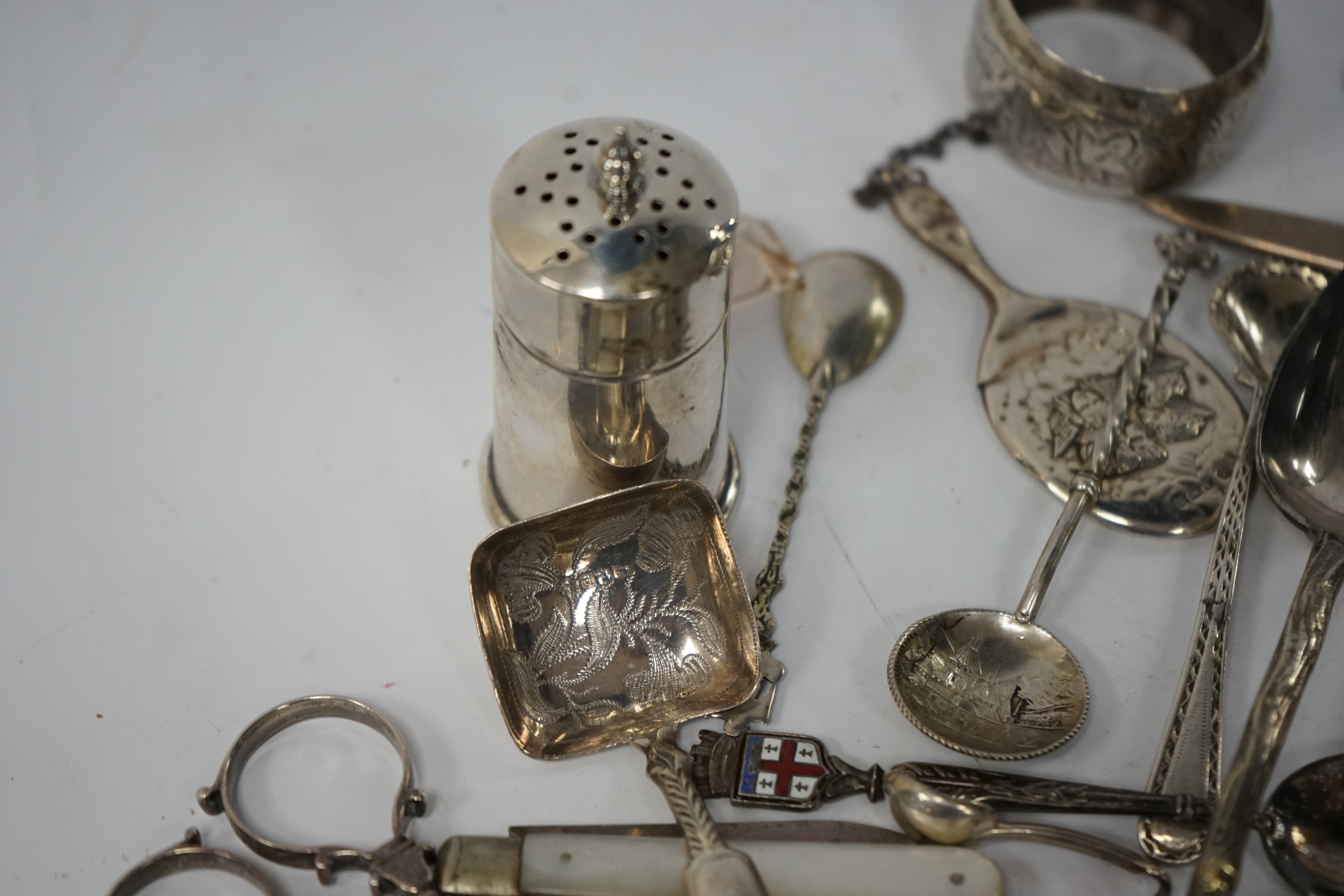 Assorted small silver and other white metal items including fruit knives, a pair of Georgian sugar nips, by Henry Plumpton, circa 1750, a pair of Victorian grape shears, Wakely & Wheeler, London 1887, pepperette, a Georg